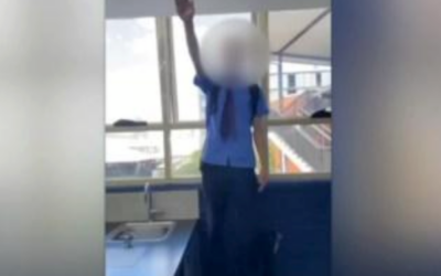 A student from Marcellin College Randwick can be seen performing the Nazi salute and mimicking Adolf Hitler’s moustache, while wearing full school uniform and standing on a chair in a classroom. Picture: Sky News Australia.